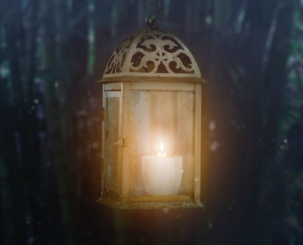 lantern with lit candle inside